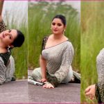 করলা গাছের জন্য সুতা দিয়ে মাচা তৈরি করছেন এক কৃষক